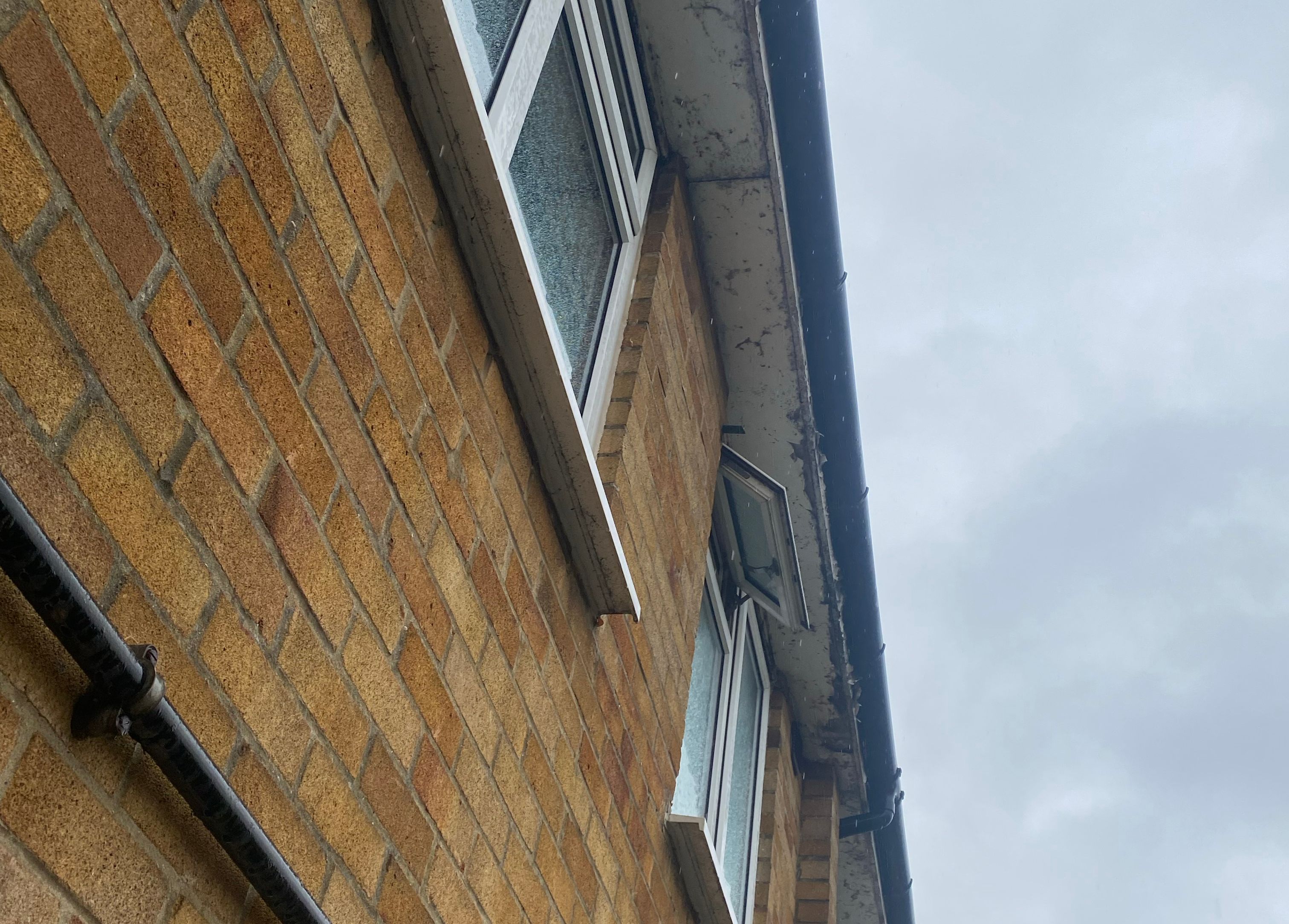 Images showcasing roofworks, windows and doors replacements at April Place.